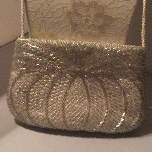 Beaded evening bag, silver in color